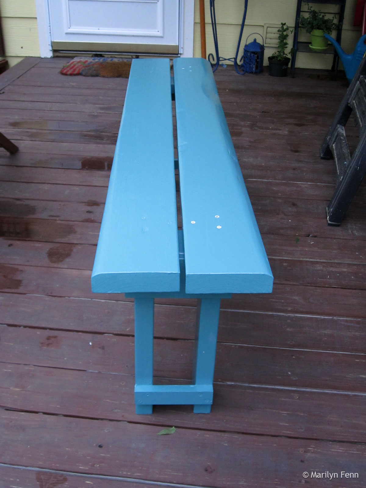 Narrow-stance garden bench, painted