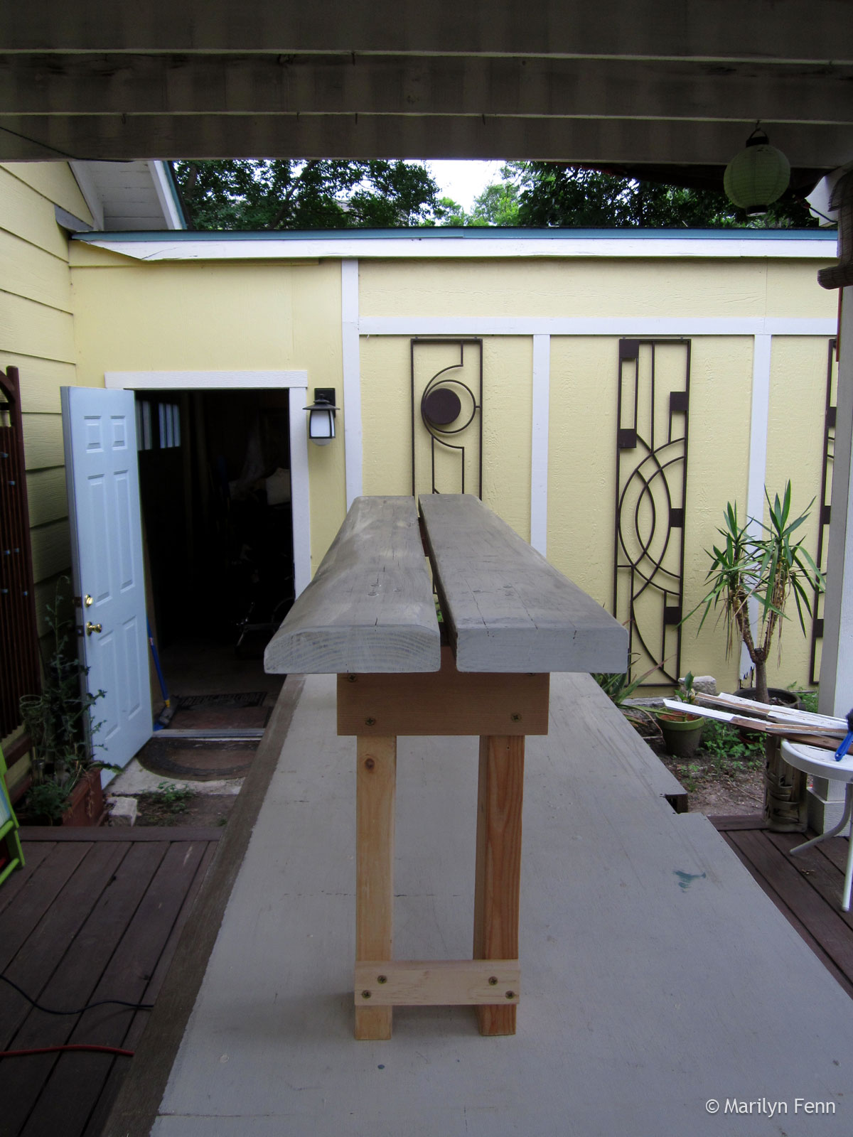 Narrow-stance garden bench