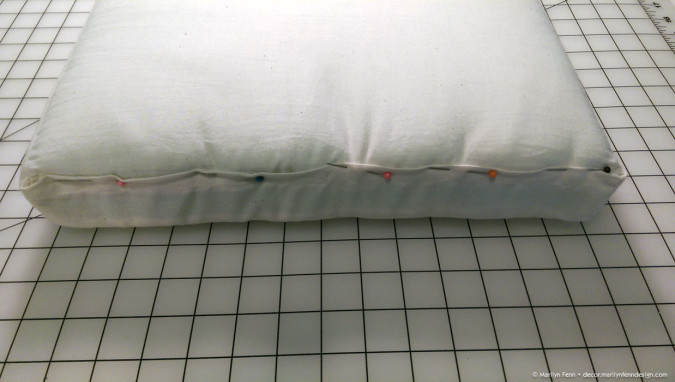Pinning the muslin cover closure for hand sewing