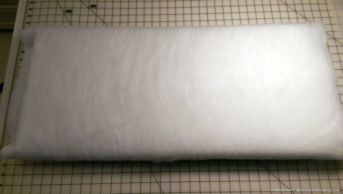 Wrapped foam cushion with batting